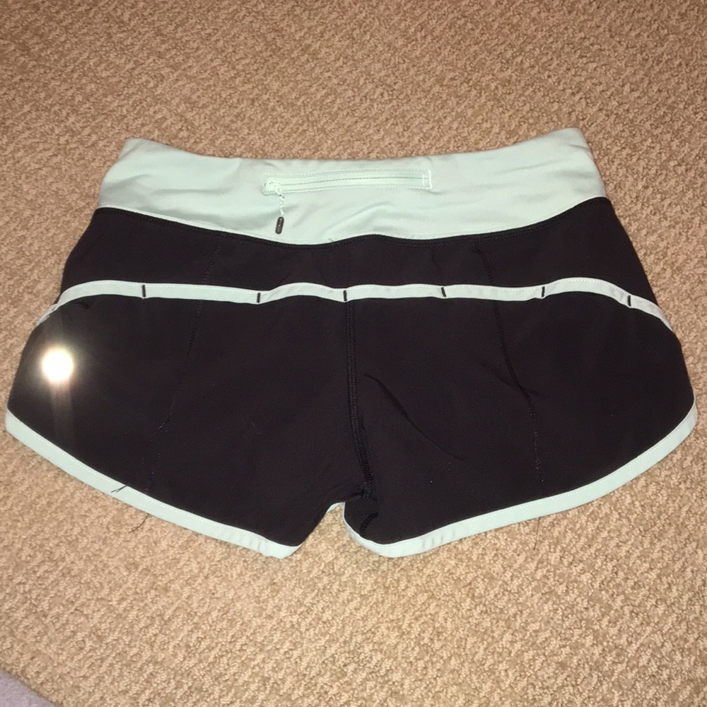 Black lululemon shorts with mint lining